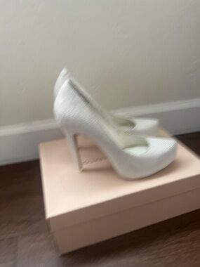 BCBGeneration White Textured Platform Stiletto Pumps